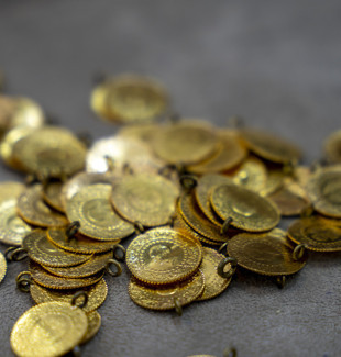 Altında sert düşüş: 3 bin 871 dolar zirvesinden geri çekildi, gramda kayıp 105 TL'ye ulaştı