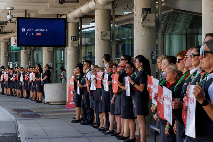 Air Canada çalışanlarından hükümet kararına rağmen greve devam kararı - Resim : 1